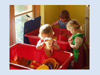 Sand and water play - messy play can be fun in the sand and water